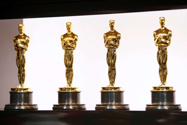 Four Oscar statuettes